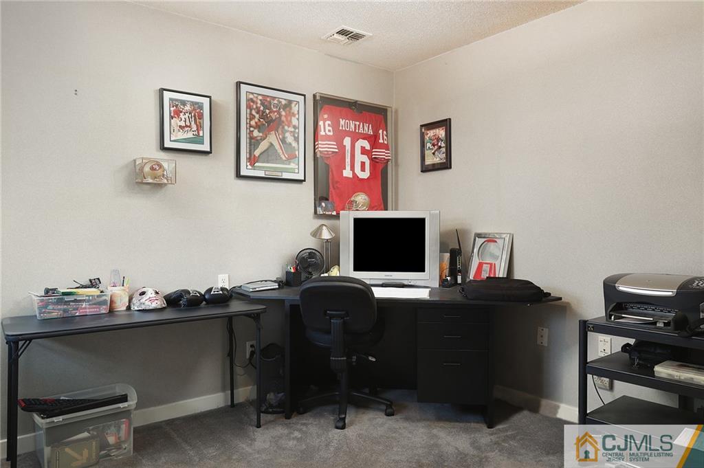 2 Rumson Road Kendall Park, NJ 08824 - Photo 17 of 28 a view of a workspace with furniture