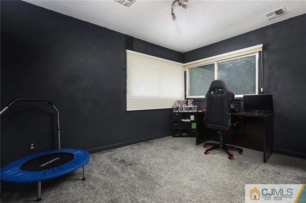 2 Rumson Road Kendall Park, NJ 08824 - Photo 18 of 28 a room with furniture and air hockey table