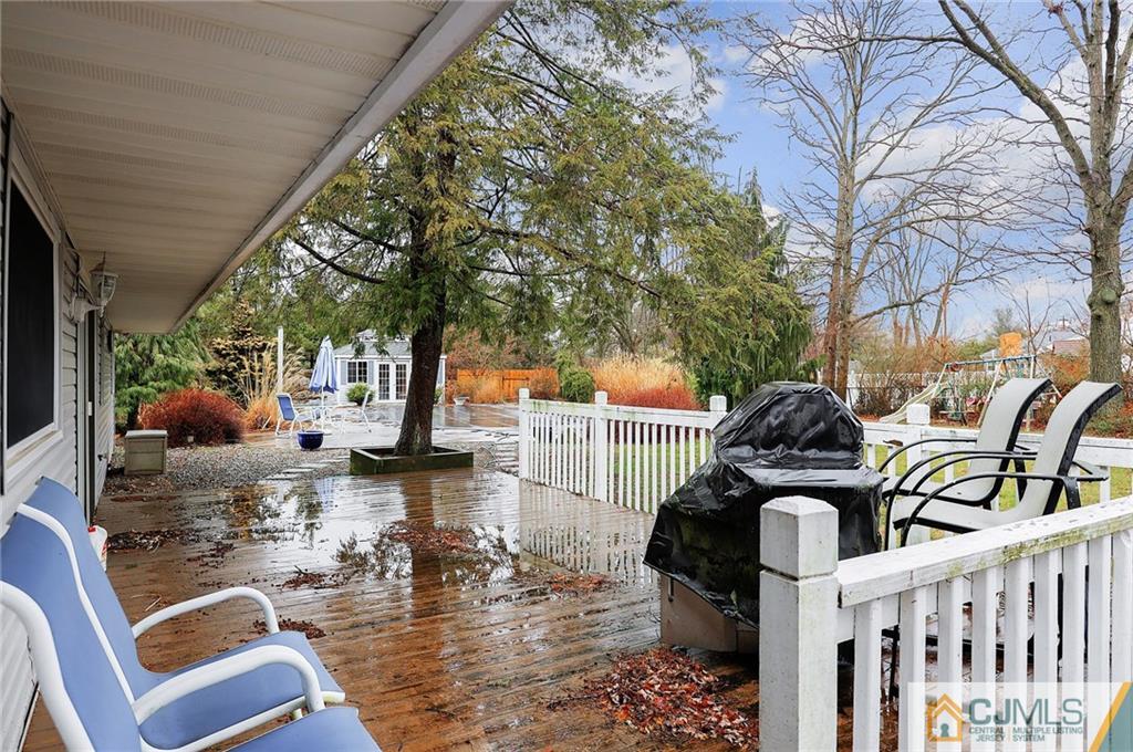 2 Rumson Road Kendall Park, NJ 08824 - Photo 19 of 28 a view of a chairs and tables in the balcony