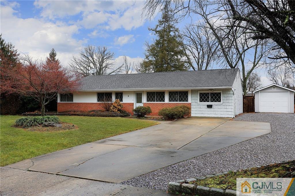 2 Rumson Road Kendall Park, NJ 08824 - Photo 3 of 28 front view of a house with a yard