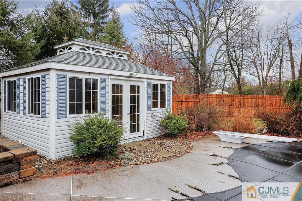 2 Rumson Road Kendall Park, NJ 08824 - Photo 21 of 28 a front view of a house with garden