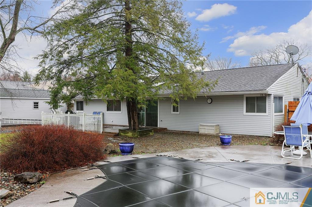 2 Rumson Road Kendall Park, NJ 08824 - Photo 24 of 28 a front view of a house with a yard