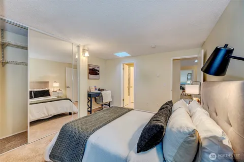 a bedroom with a bed and furniture