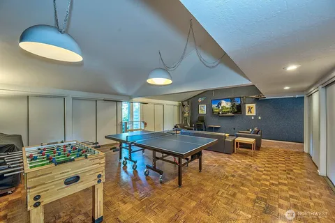 a dining room with a table and chairs