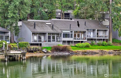 a house with river in front of it