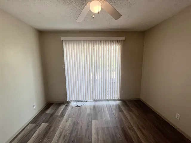 a view of a wooden door of a house