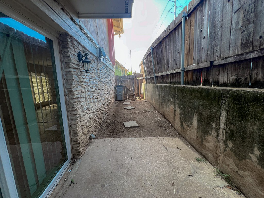 7206 Creekside Drive, Unit C Austin, TX 78752 - Photo 22 of 22 a view of a wooden door of a house
