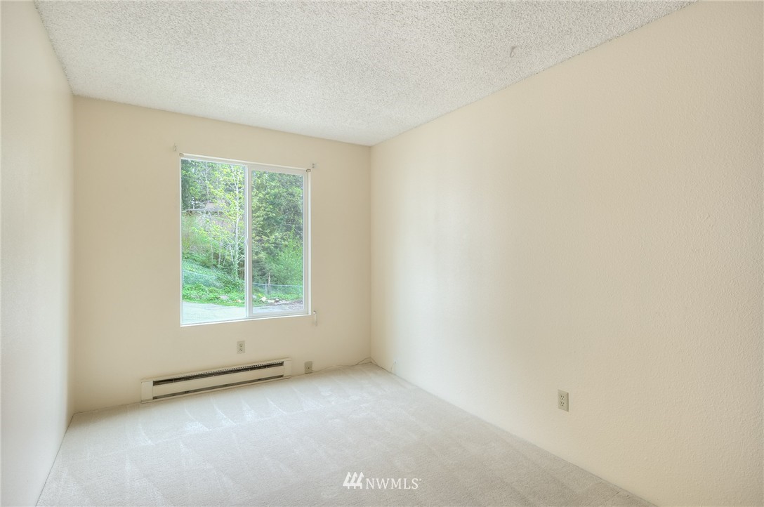 13933 Southeast Allen Road Bellevue, WA 98006 - Photo 11 of 11 an empty room with a window