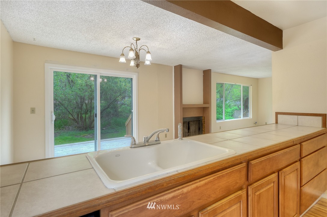13933 Southeast Allen Road Bellevue, WA 98006 - Photo 4 of 11 a view of bathroom with dual sinks