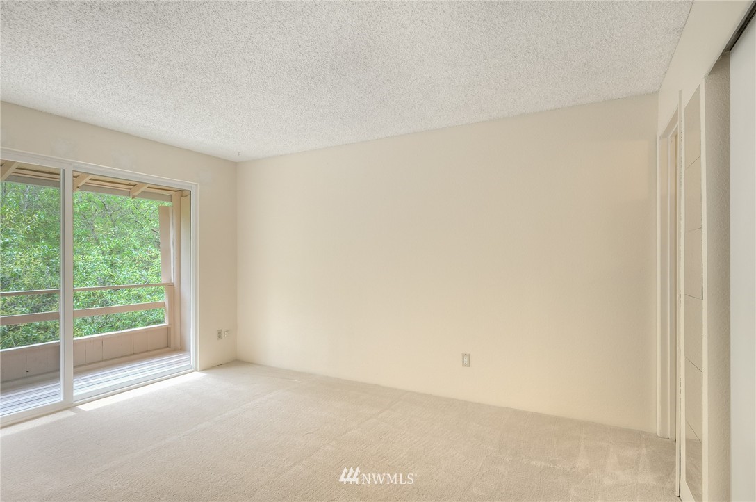 13933 Southeast Allen Road Bellevue, WA 98006 - Photo 6 of 11 a view of a room that has a window in it