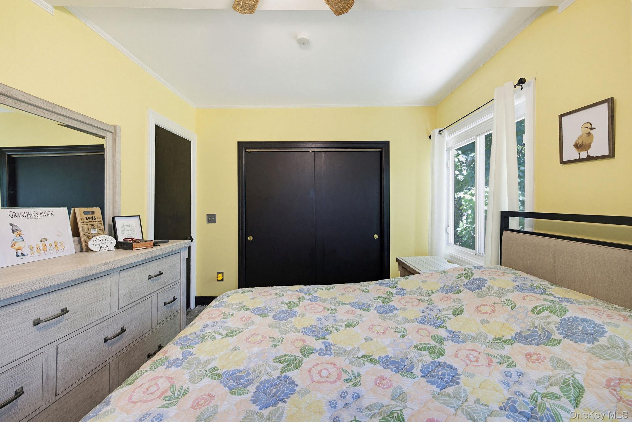 12 Bradhurst Road Carmel, NY 10512 - Photo 7 of 28 a bedroom with a bed and a dresser