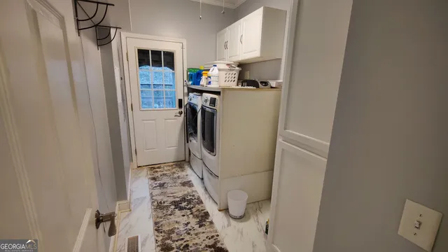 a workspace with furniture and wooden floor