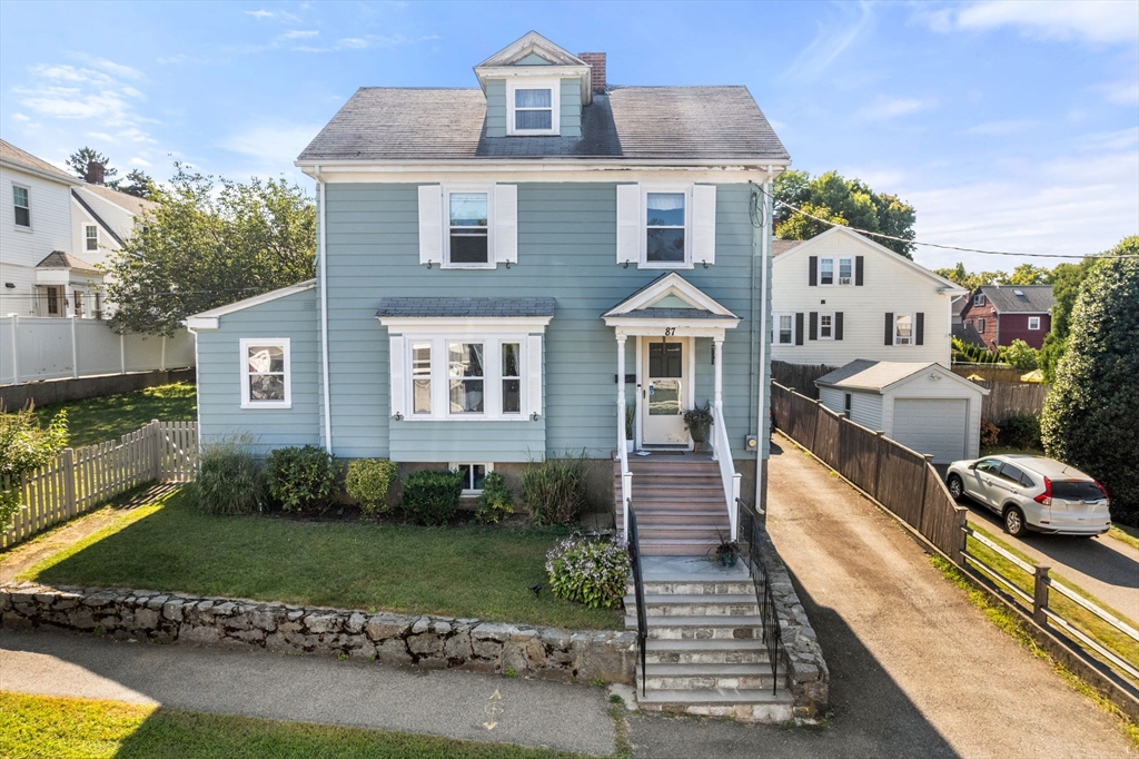 87 Waldeck Road Milton, MA 02186 - Photo 1 of 21 a front view of a house with a yard