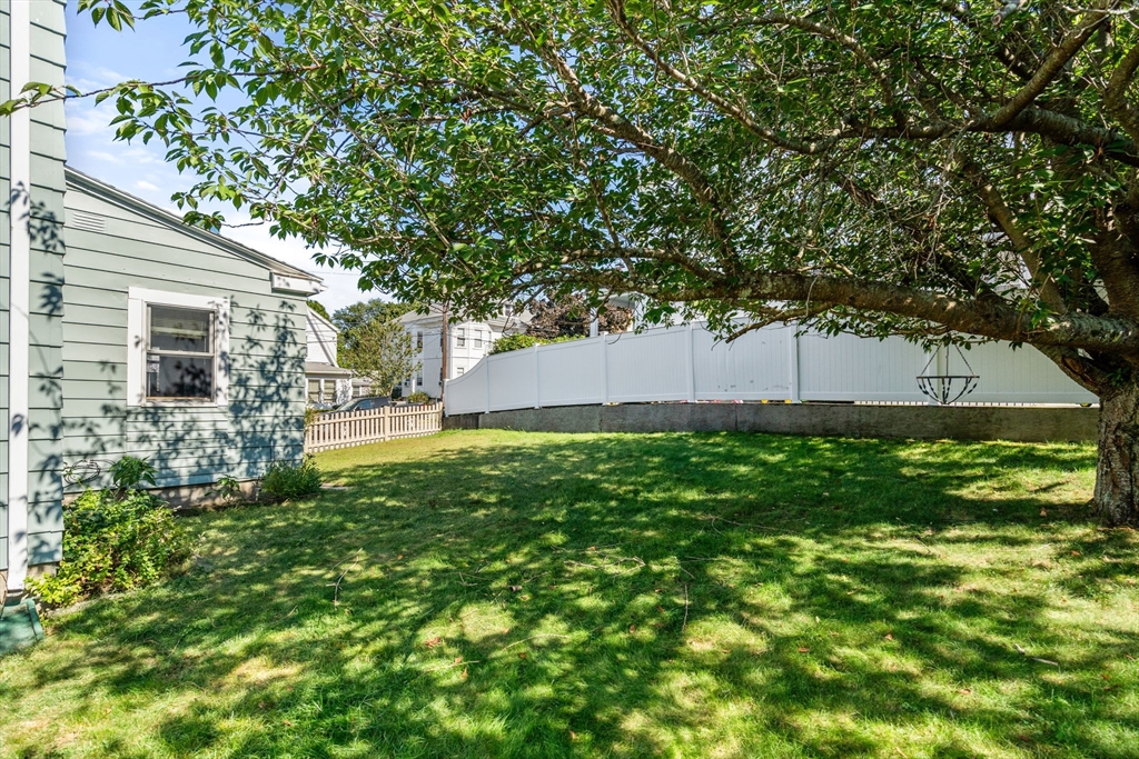 87 Waldeck Road Milton, MA 02186 - Photo 20 of 21 a view of house with backyard