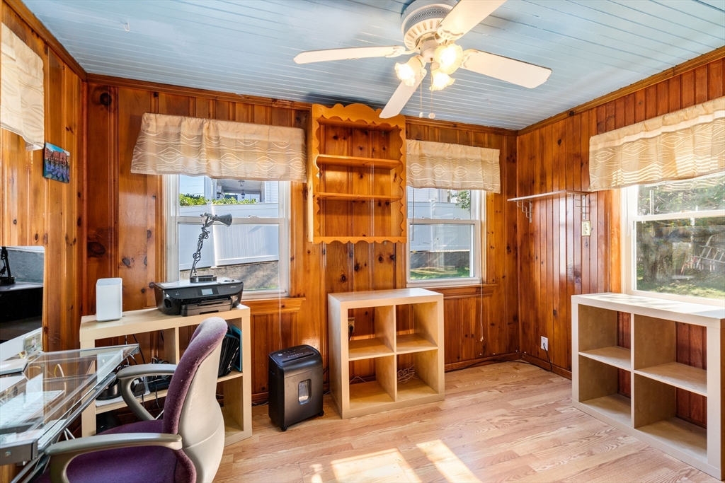 87 Waldeck Road Milton, MA 02186 - Photo 10 of 21 a view of a workspace with furniture and a window