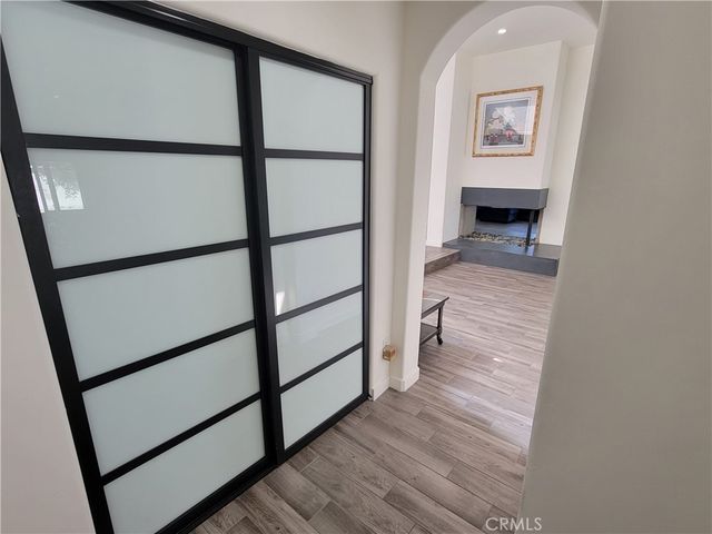 a view of gallery with wooden floor