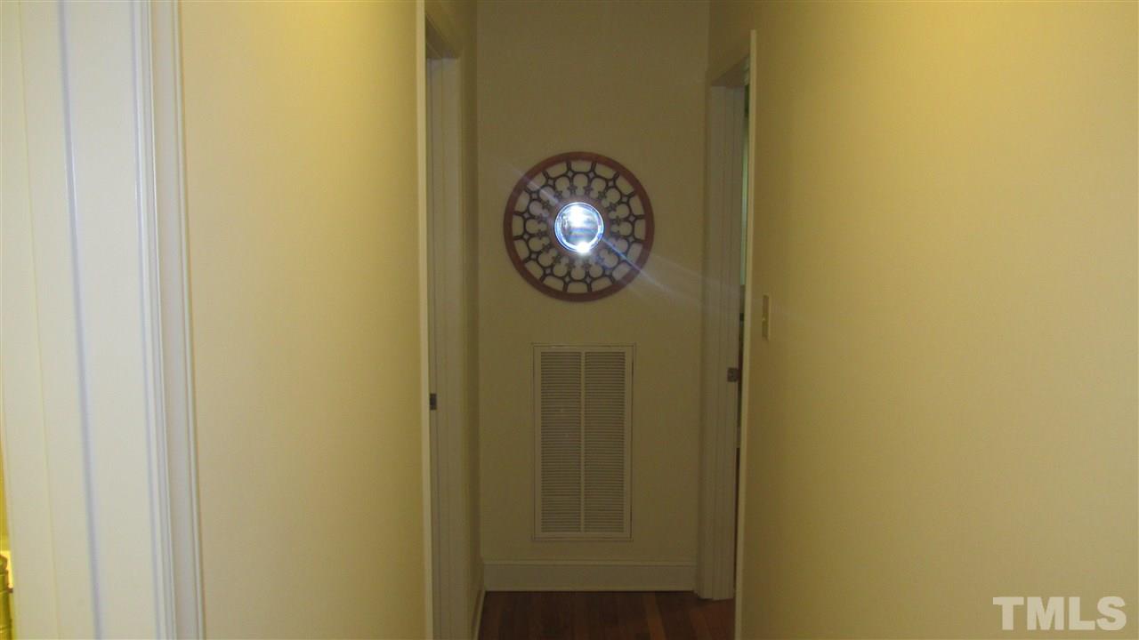 4823 Revere Road Durham, NC 27713 - Photo 12 of 15 a view of entryway with a mirror
