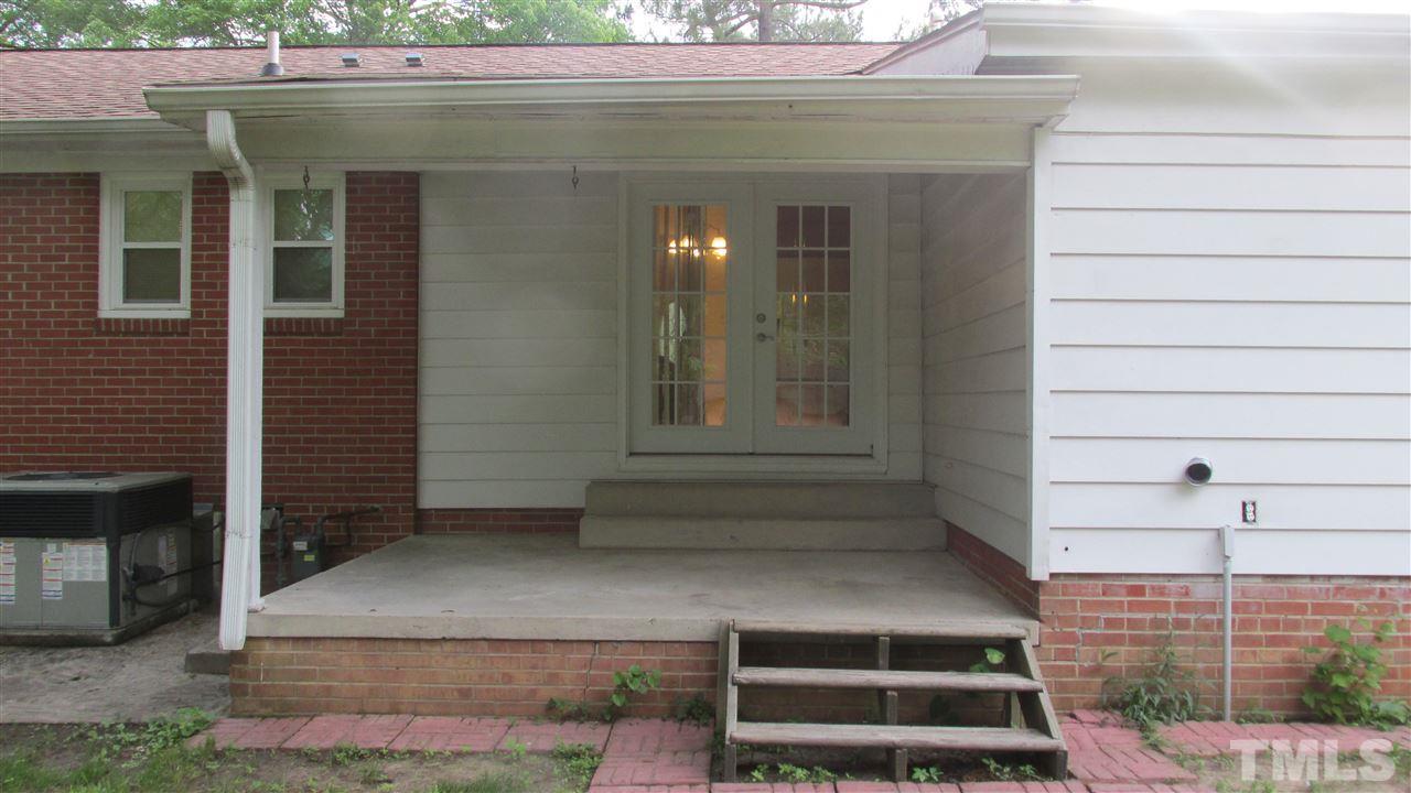 4823 Revere Road Durham, NC 27713 - Photo 14 of 15 a view of house with outdoor space