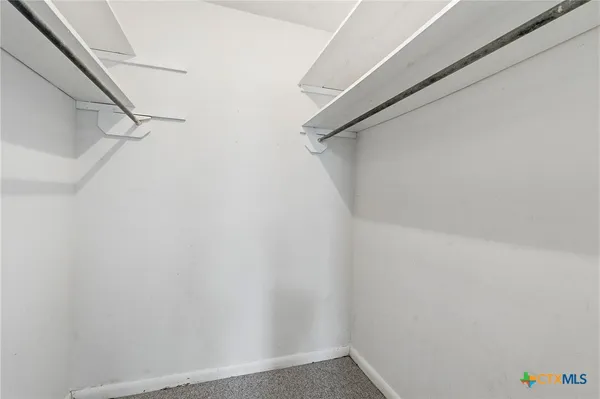 a view of small space with racks on the wall