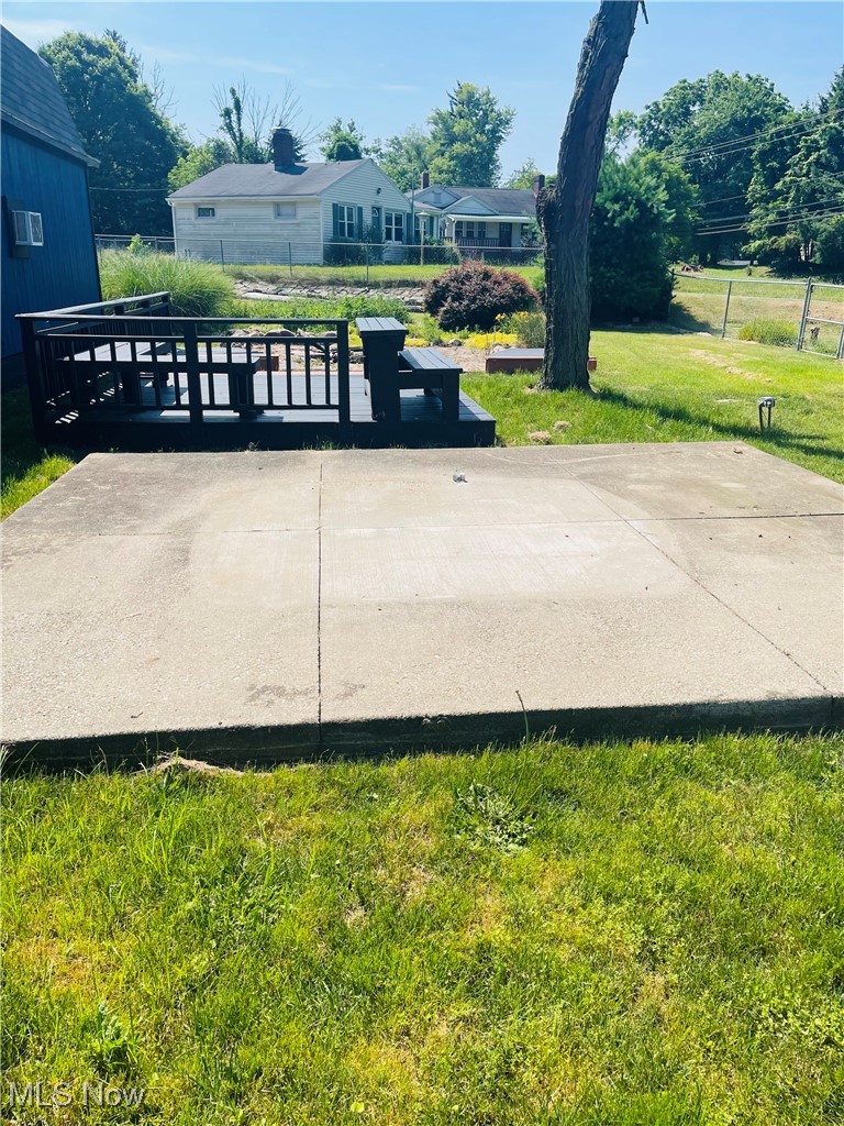 2557 Mayfair Road Akron, OH 44312 - Photo 35 of 39 Cement Patio & Wood decking with firepit on the other side.