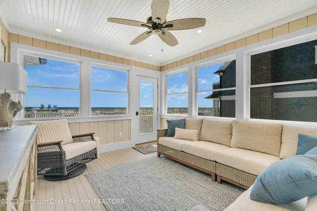 a living room with furniture and a table