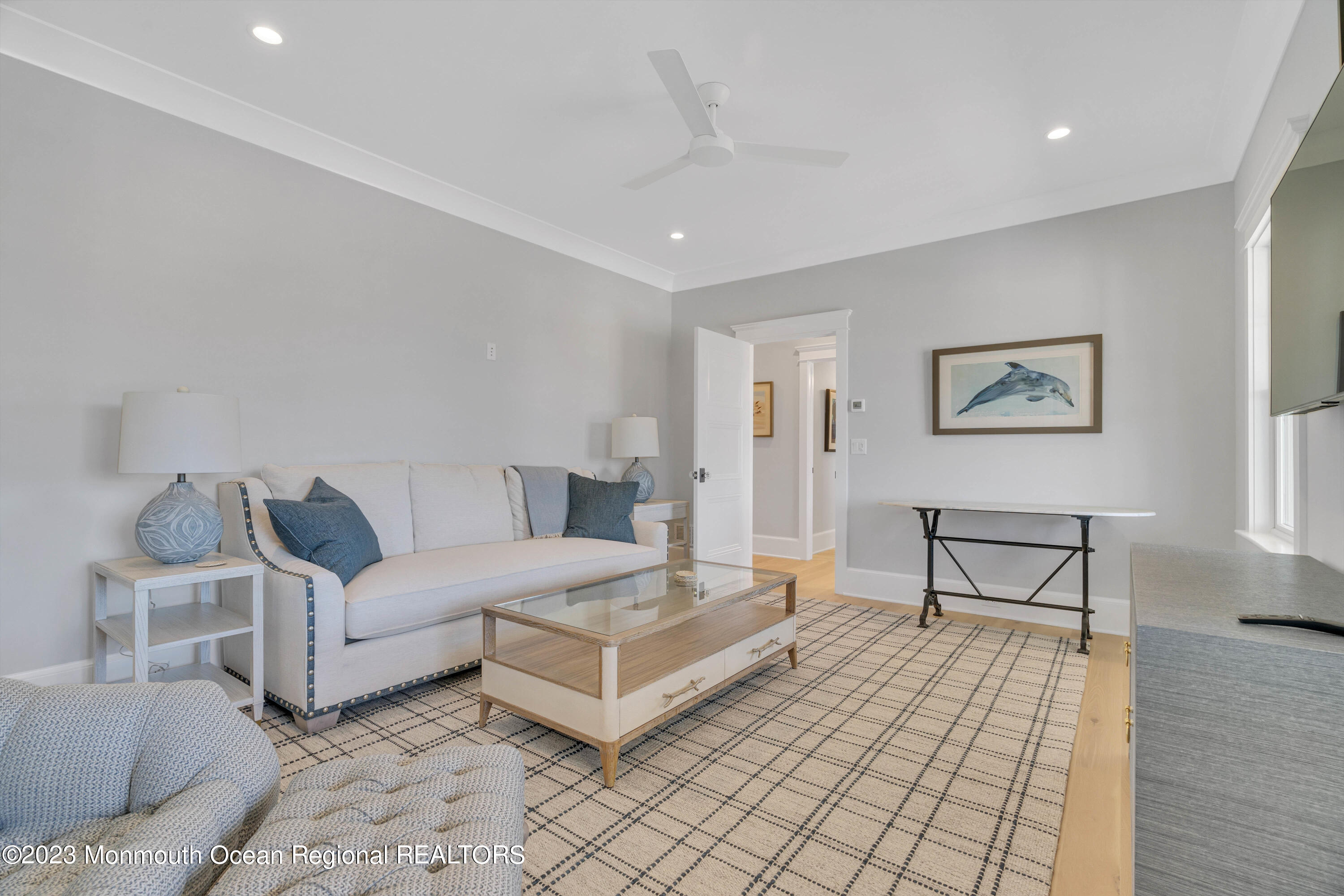 1407 Ocean Avenue Mantoloking, NJ 08738 - Photo 12 of 41 a living room with furniture and a table