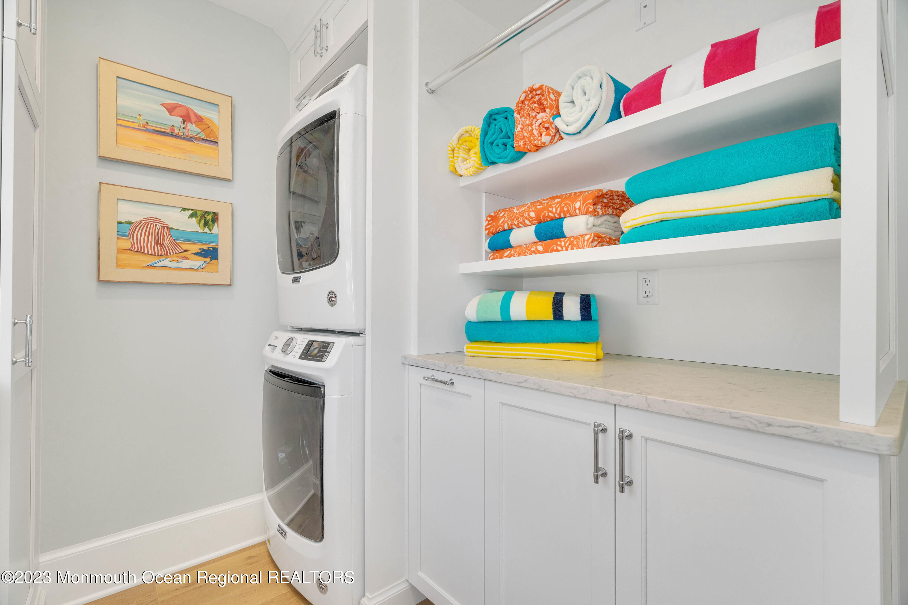 1407 Ocean Avenue Mantoloking, NJ 08738 - Photo 13 of 41 a room that has a painting on the wall