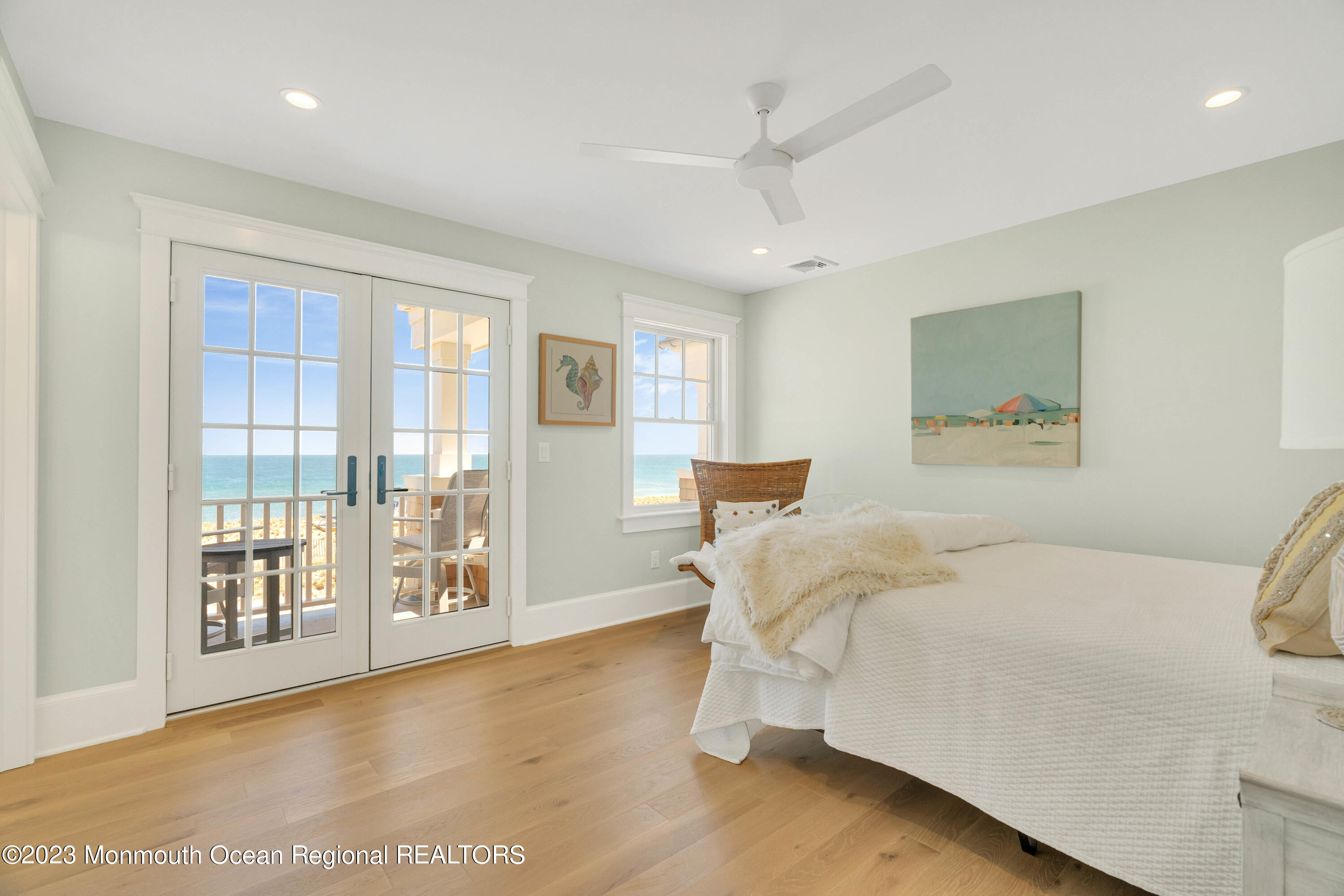 1407 Ocean Avenue Mantoloking, NJ 08738 - Photo 24 of 41 a bedroom with a bed and a large window