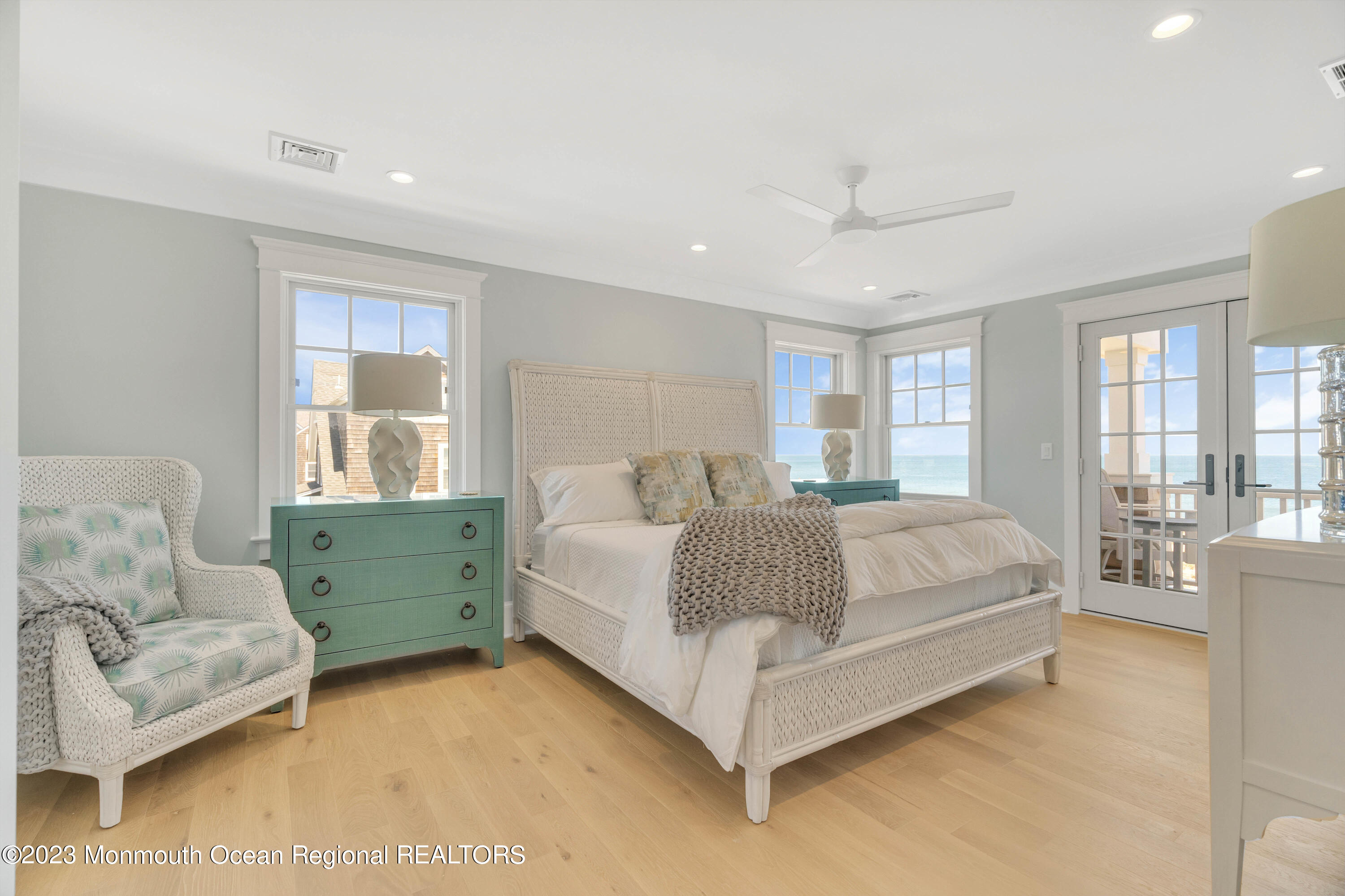 1407 Ocean Avenue Mantoloking, NJ 08738 - Photo 26 of 41 a spacious bedroom with a bed and a large window