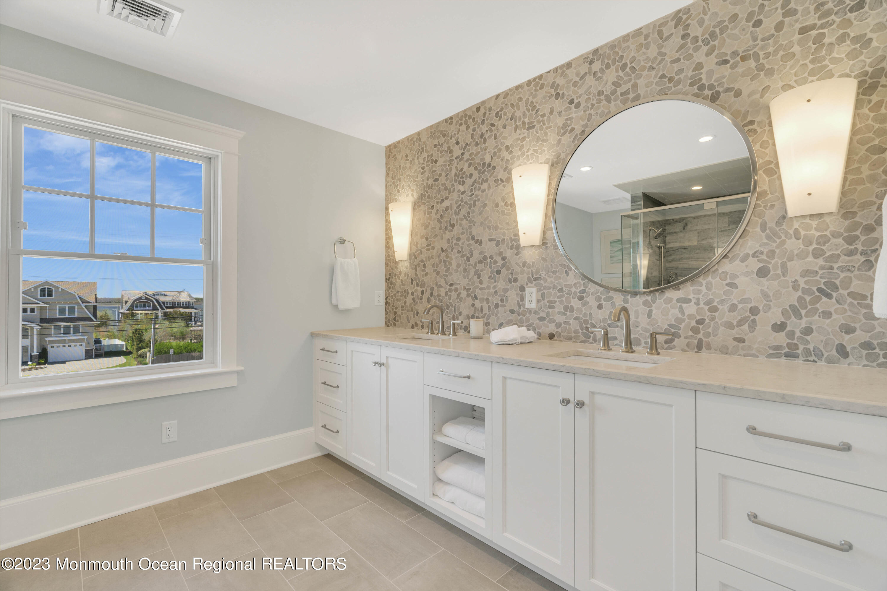 1407 Ocean Avenue Mantoloking, NJ 08738 - Photo 27 of 41 a bathroom with a sink and a mirror
