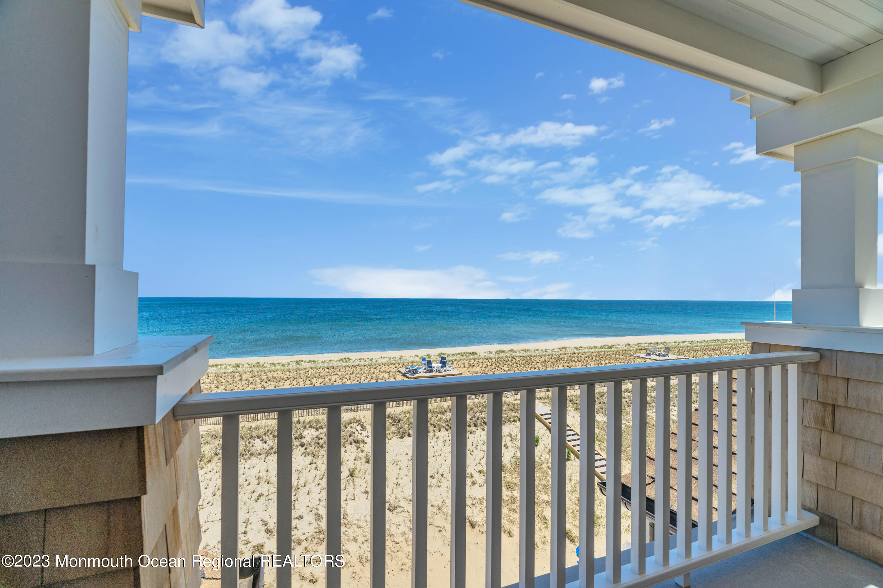 1407 Ocean Avenue Mantoloking, NJ 08738 - Photo 35 of 41 a balcony with an ocean view