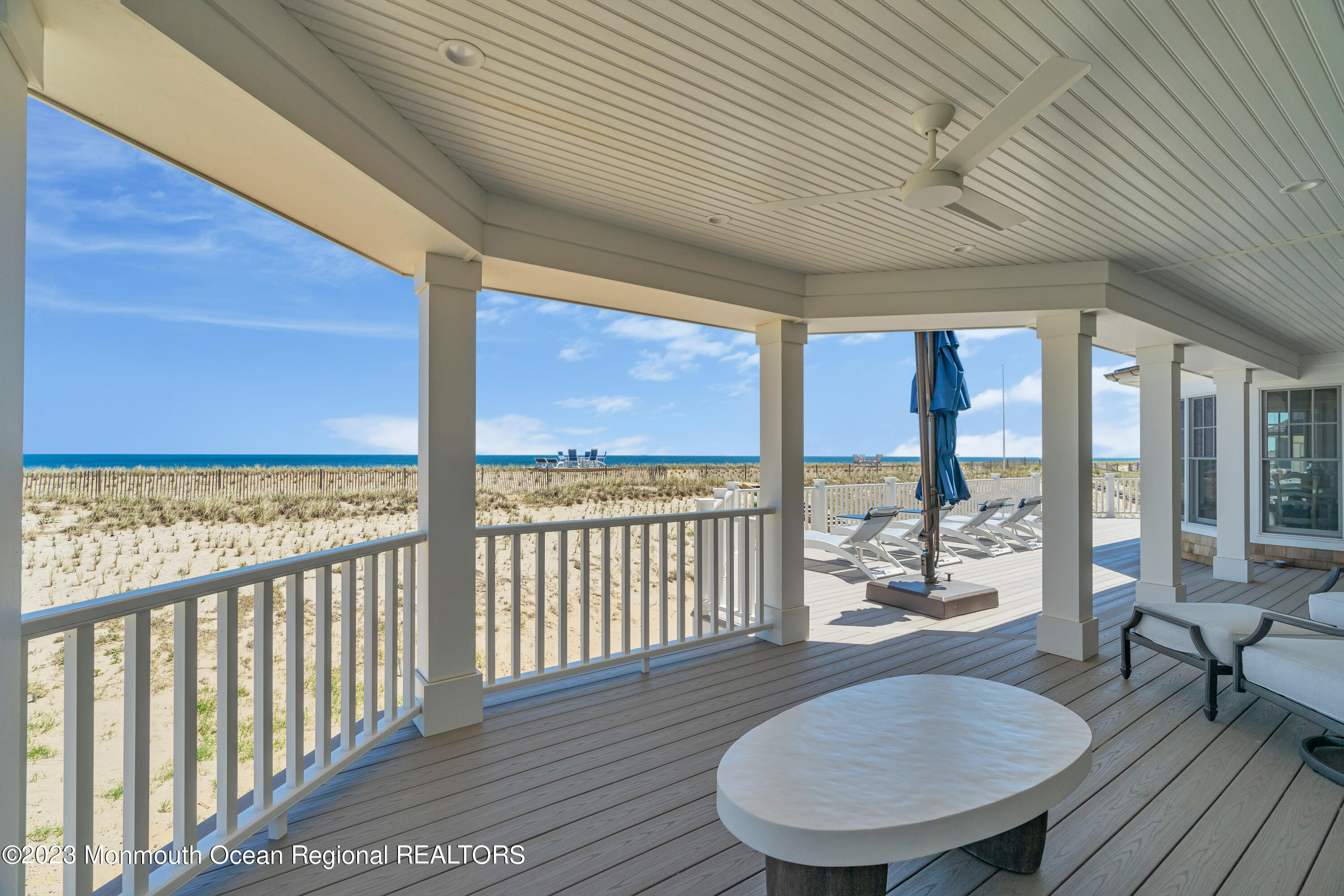 1407 Ocean Avenue Mantoloking, NJ 08738 - Photo 36 of 41 a view of a balcony furniture and wooden floor