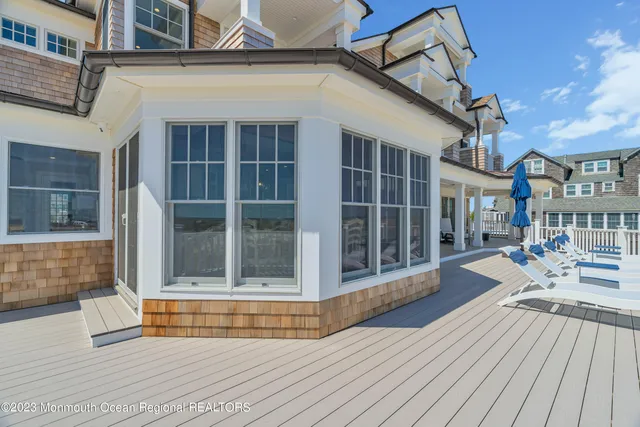 a view of roof deck with patio