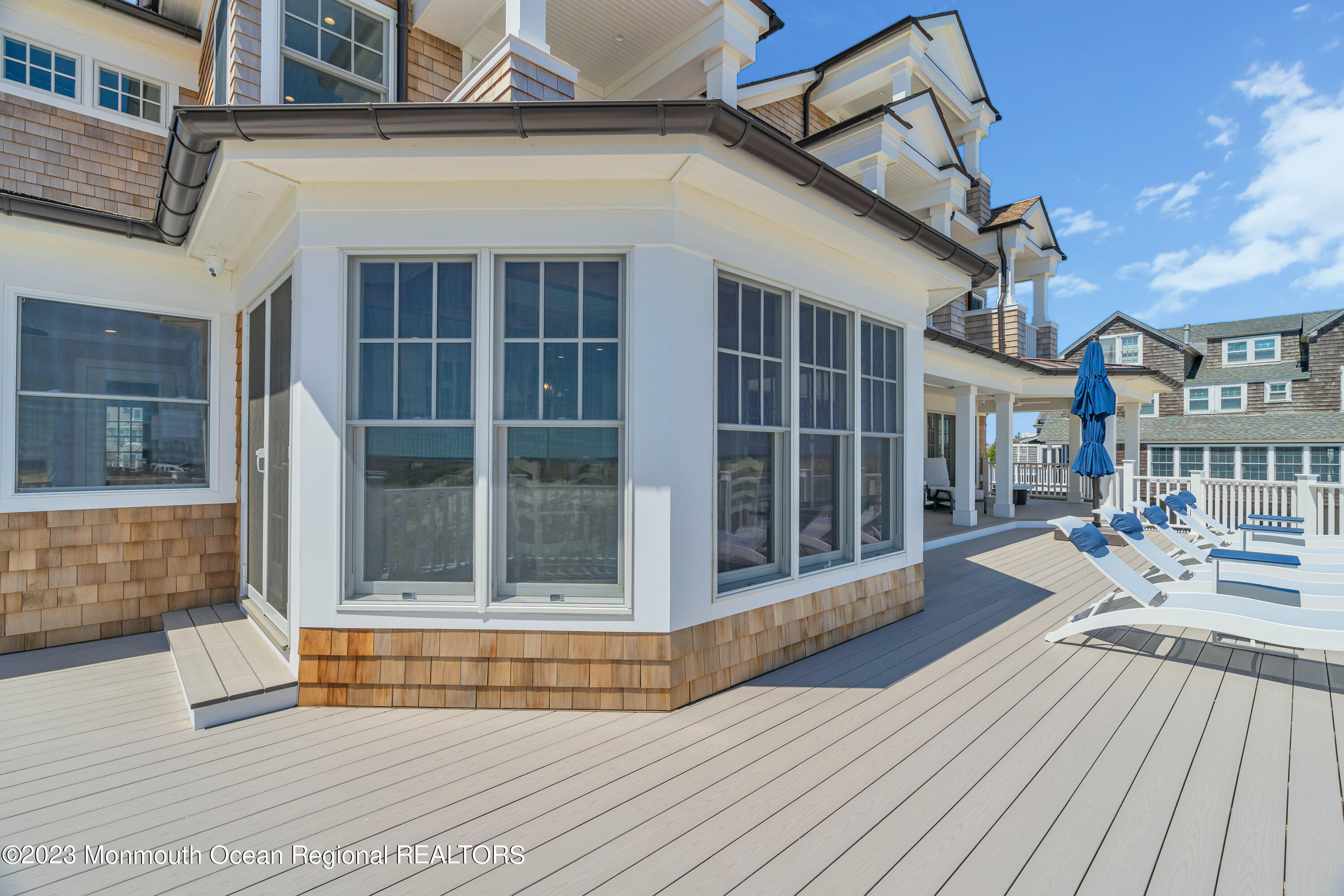 1407 Ocean Avenue Mantoloking, NJ 08738 - Photo 37 of 41 a view of a house with a large window