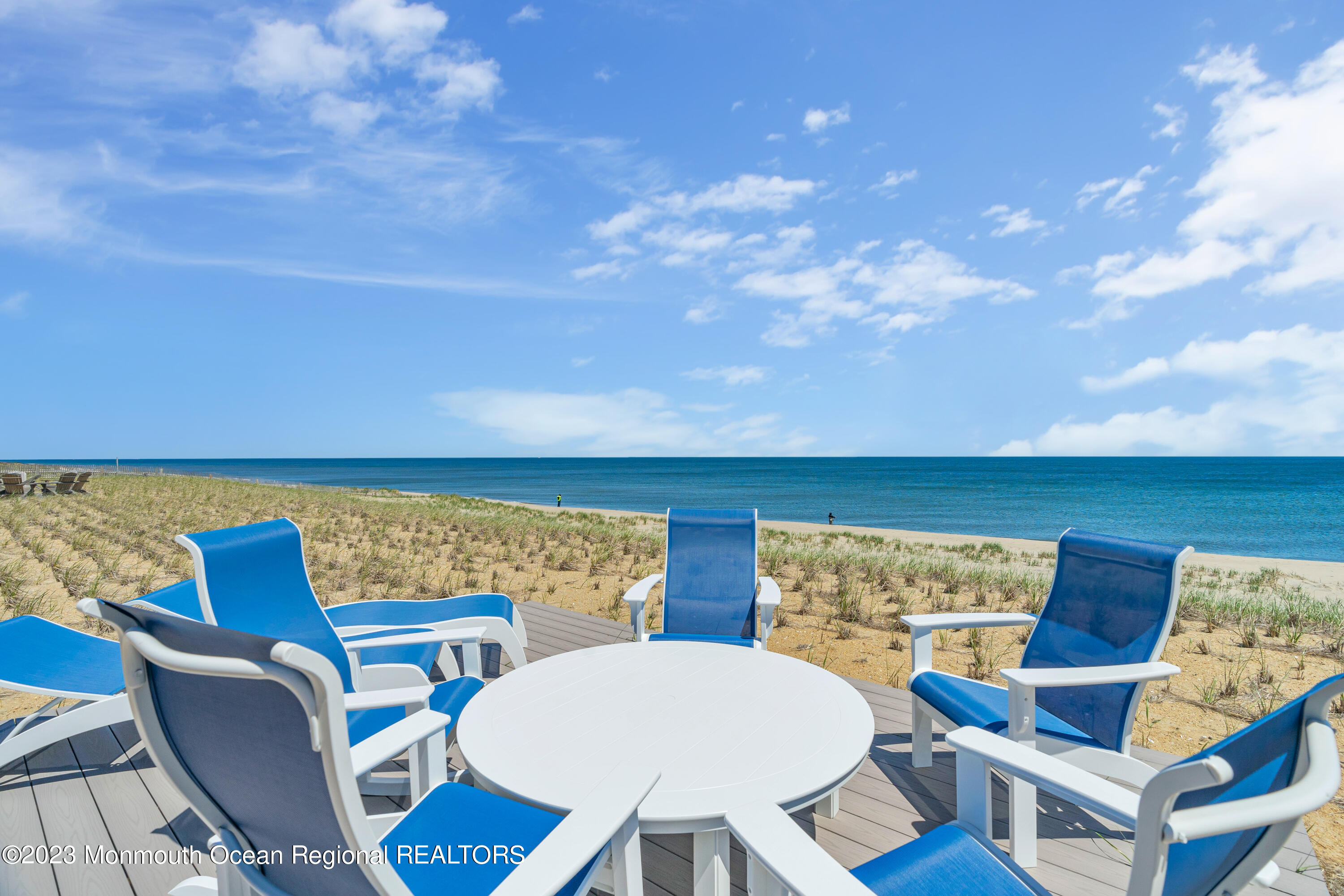 1407 Ocean Avenue Mantoloking, NJ 08738 - Photo 38 of 41 a view of a chairs and table in a patio