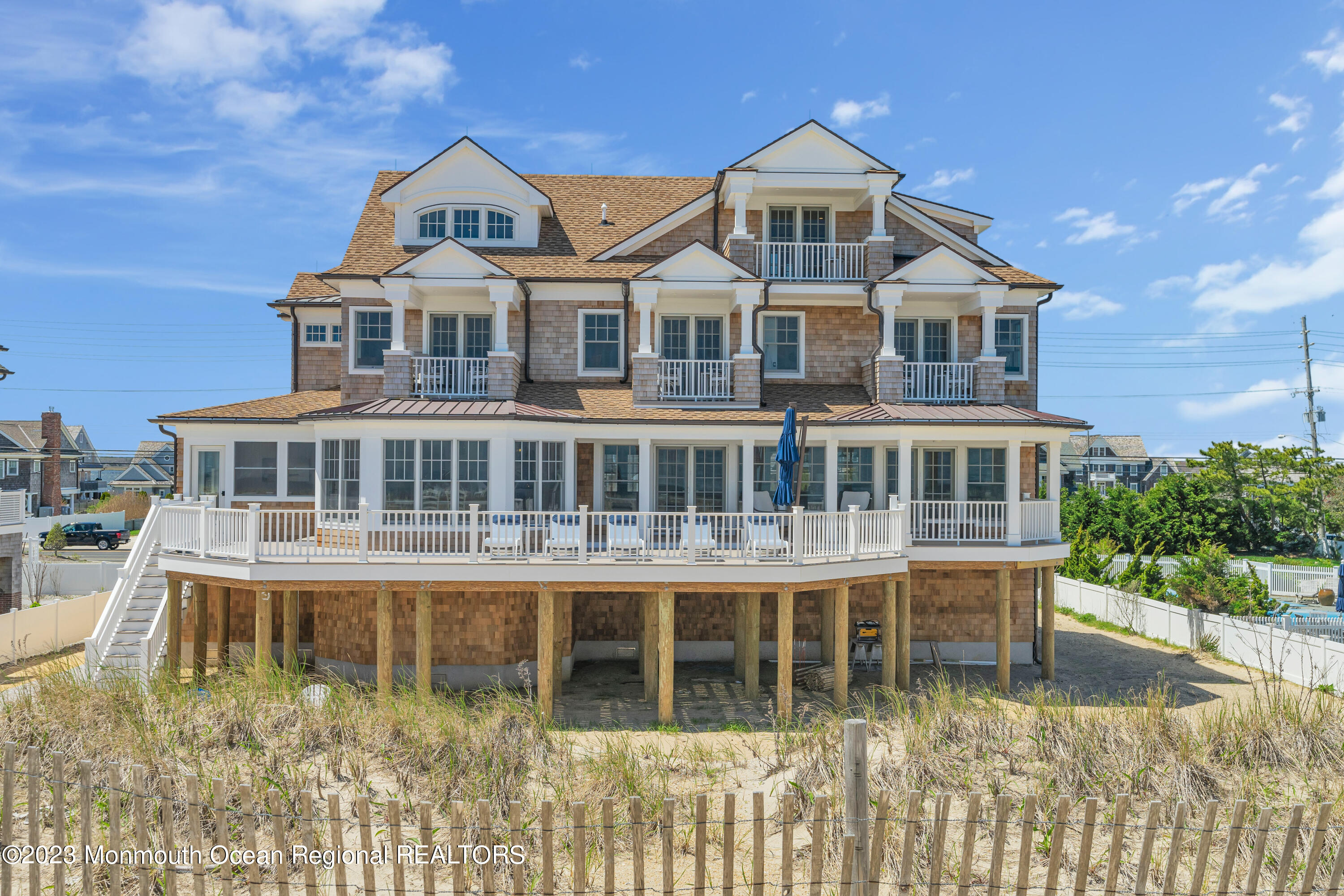 1407 Ocean Avenue Mantoloking, NJ 08738 - Photo 41 of 41 a front view of a house with a yard