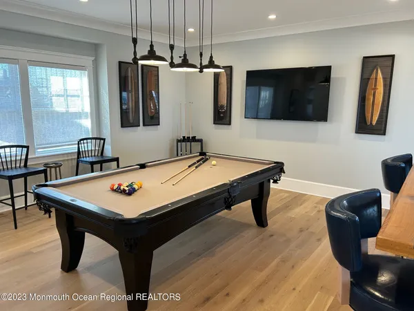 a living room with furniture and a rug