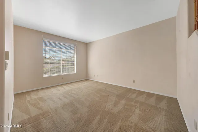 a kitchen with stainless steel appliances granite countertop a refrigerator a stove top oven a sink and dishwasher