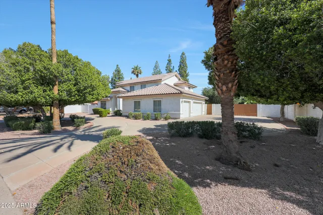 a view of a swimming pool with a backyard