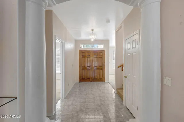 a utility room with cabinets