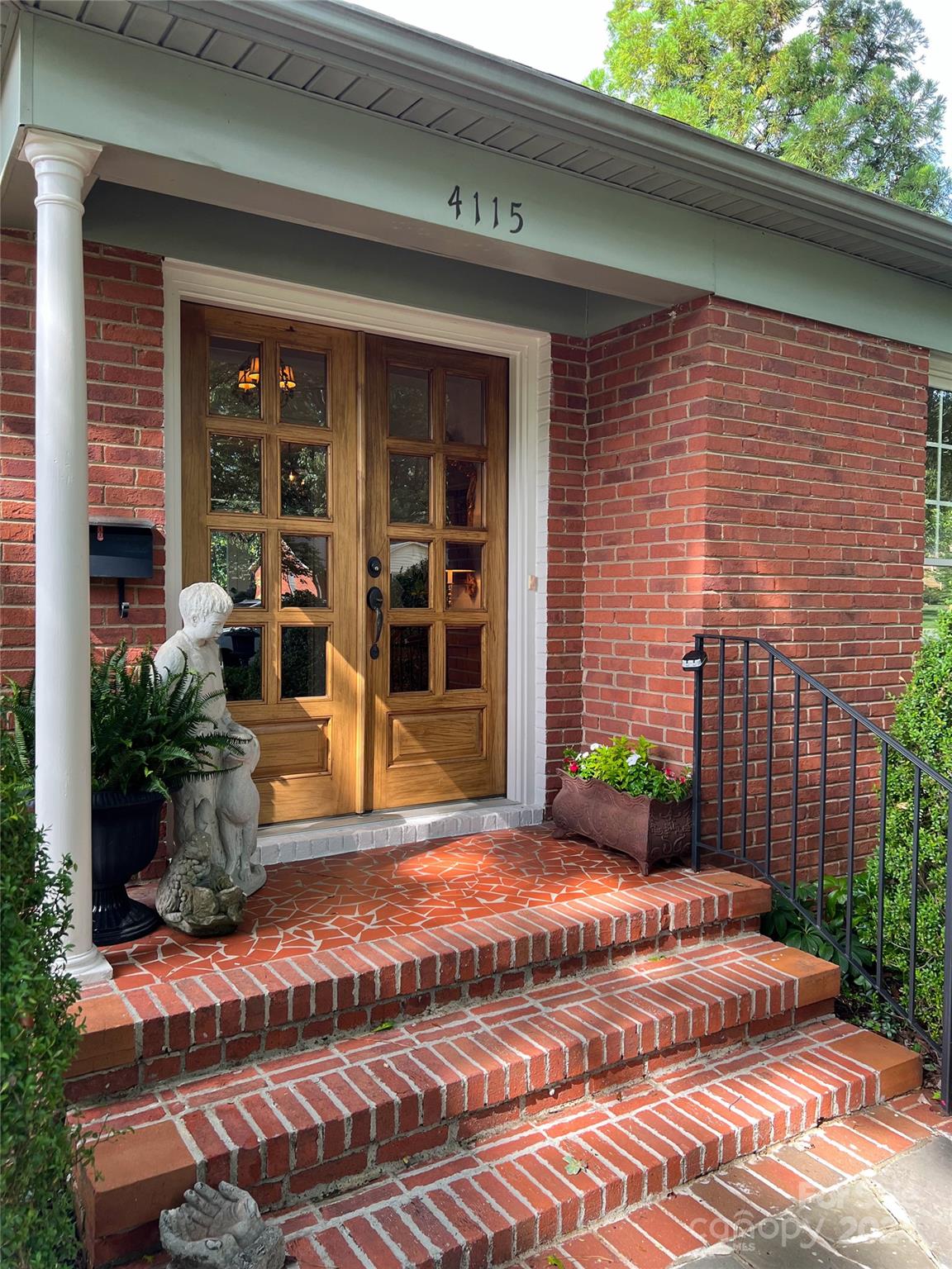 4115 Rutherford Drive Charlotte, NC 28210 - Photo 2 of 26 a view of a house with backyard and sitting area