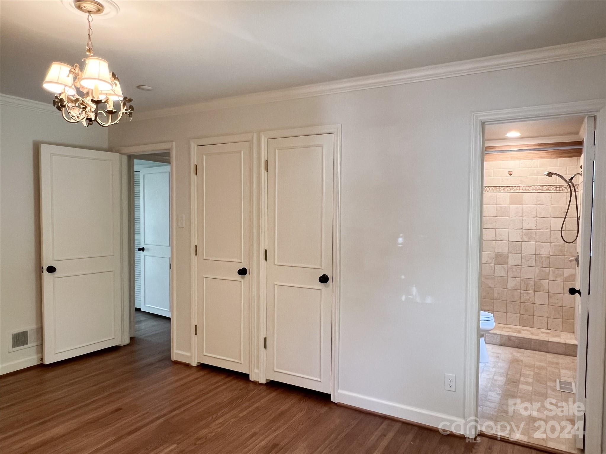 4115 Rutherford Drive Charlotte, NC 28210 - Photo 22 of 26 a view of an entryway with wooden floor