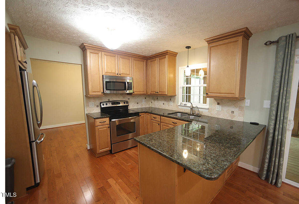 116 Trinity Woods Drive Raleigh, NC 27607 - Photo 8 of 32 116 Trinity Woods DrG