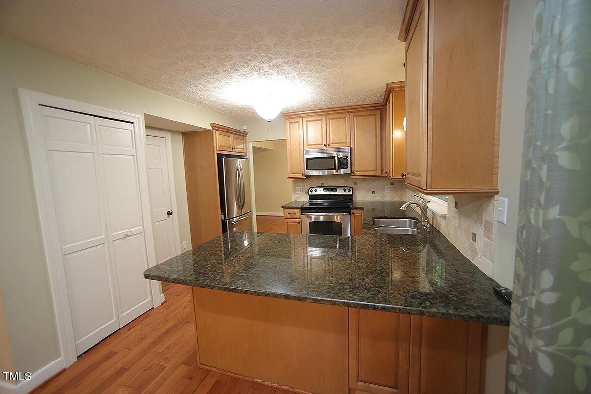 116 Trinity Woods Drive Raleigh, NC 27607 - Photo 9 of 32 116 Trinity Woods DrH