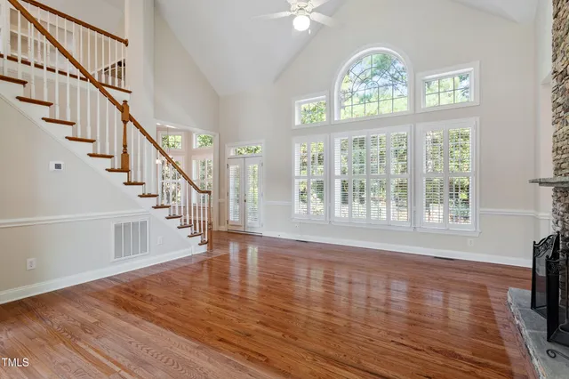a kitchen with stainless steel appliances granite countertop a sink and a stove