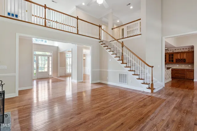 a kitchen with stainless steel appliances granite countertop a stove and a sink