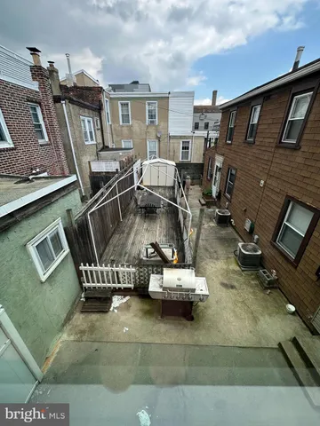 a view of a patio with swimming pool