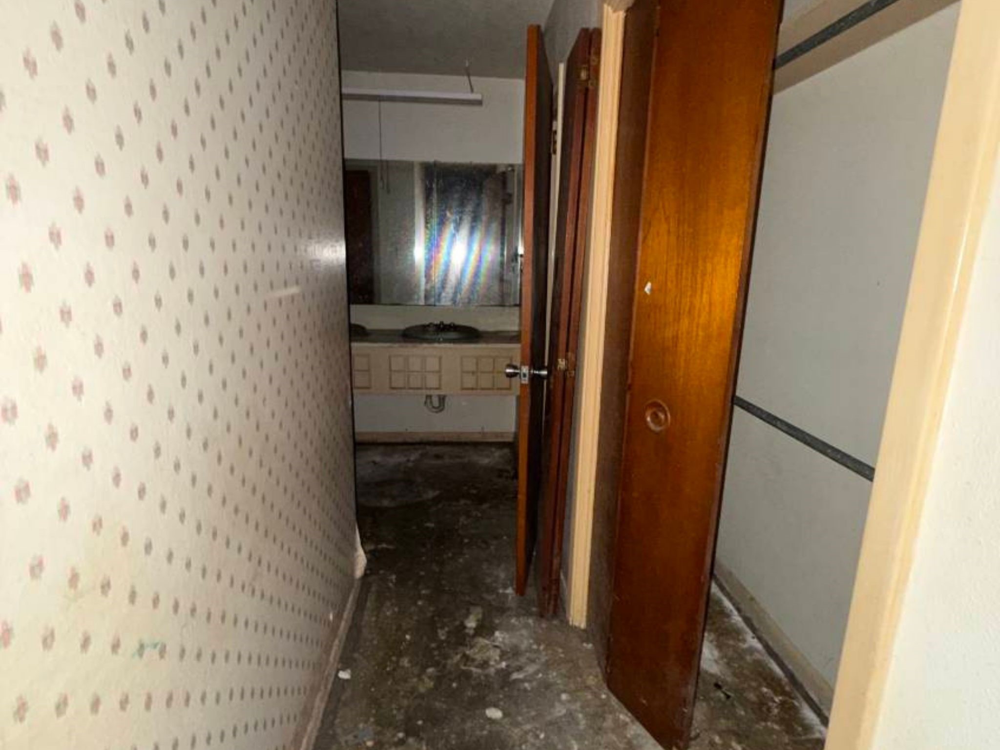 5006 Interlachen Street Baytown, TX 77521 - Photo 19 of 26 a bathroom with a sink and a mirror