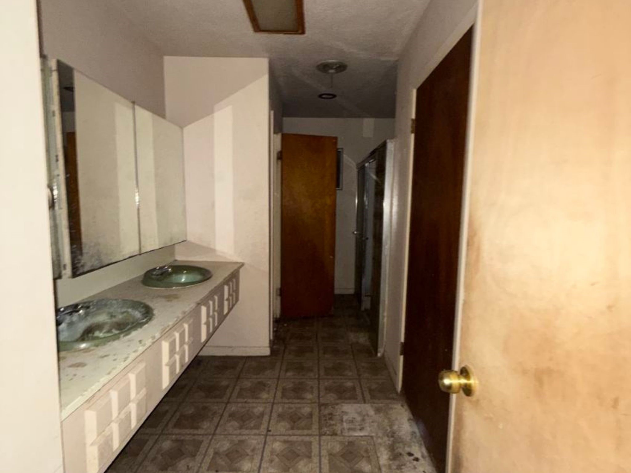 5006 Interlachen Street Baytown, TX 77521 - Photo 26 of 26 a bathroom with a granite countertop sink and a mirror
