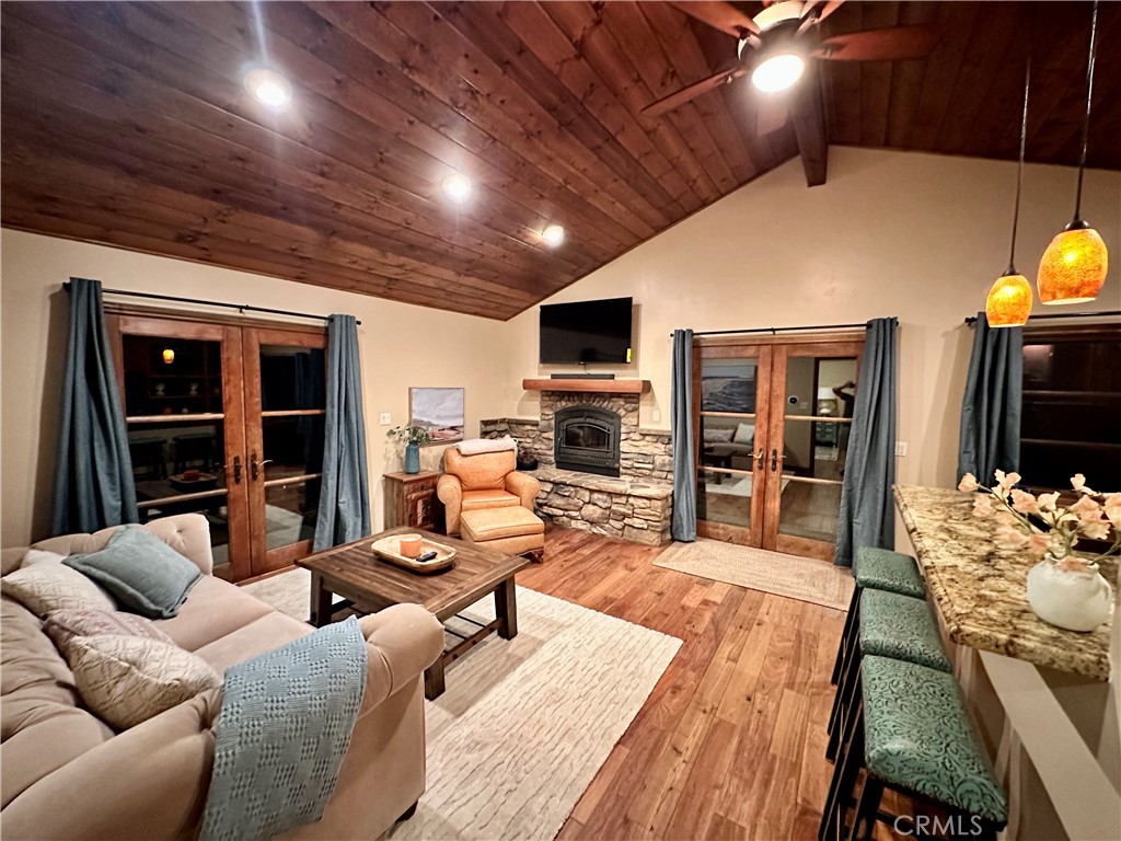 35650 Pyramid Peak Road Mountain Center, CA 92561 - Photo 20 of 24 a living room with furniture and a flat screen tv